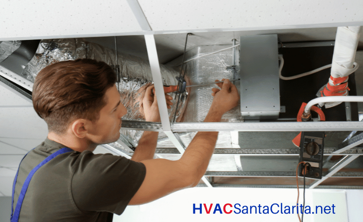 HVAC technician repairs central air